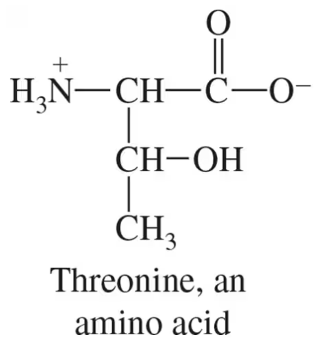 Chemical structure of threonine, an amino acid, with chiral centers marked by asterisks.