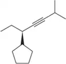 Chemical structure of an alkyne with a pentagonal ring, illustrating the R and S configuration for nomenclature.