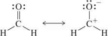 Two resonance structures of a molecule, showing electron movement with arrows between them.