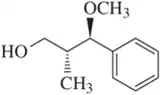 Chemical structure of a chiral molecule with hydroxyl, methyl, and methoxy groups attached to a carbon chain.