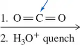 Chemical reaction diagram showing a carbonyl compound with an arrow indicating a quenching step involving water.