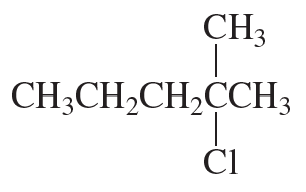 Structural formula of a compound showing carbon chains and a chlorine atom, relevant for E1 reaction analysis.
