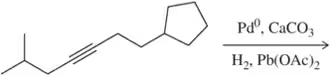 Chemical structure showing alkyne hydrogenation with a poisoned catalyst, including reactants and reaction conditions.