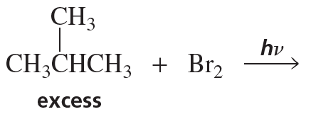Chemical reaction showing alkyl halide formation from an alkene and bromine under light, with "excess" noted below.